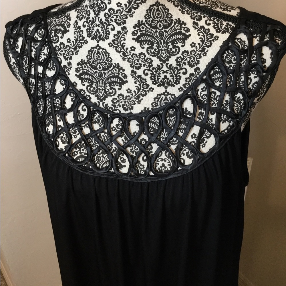Elegant black dress with peekaboo neckline